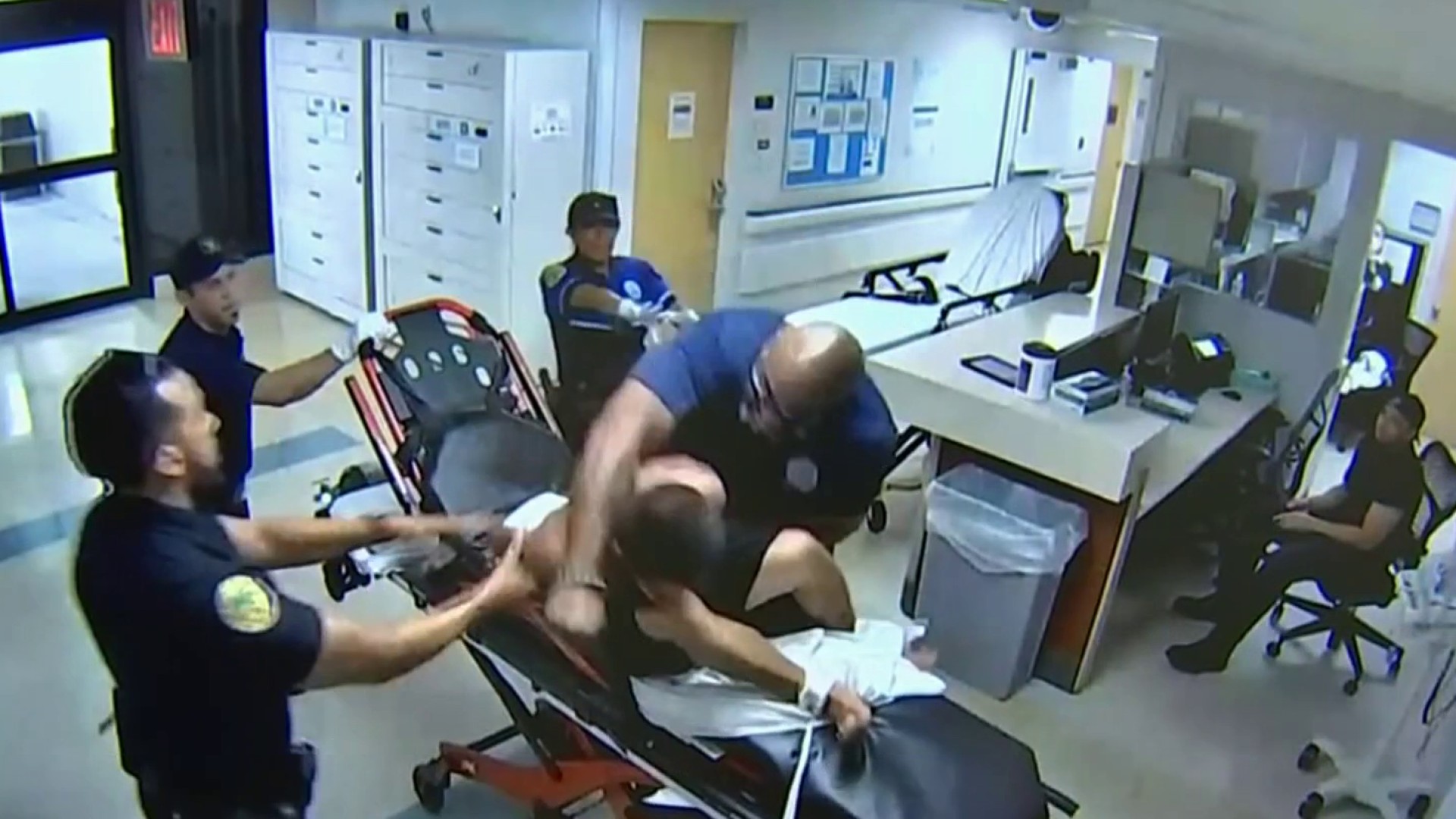 ‘No Regrets': Miami Firefighter Caught on Video Punching Handcuffed Patient