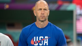 Greg Berhalter of the United States lines up for the national anthem before a FIFA World Cup Qatar 2022 Round of 16 match between Netherlands and USMNT at Khalifa International Stadium on December 3, 2022 in Doha, Qatar.