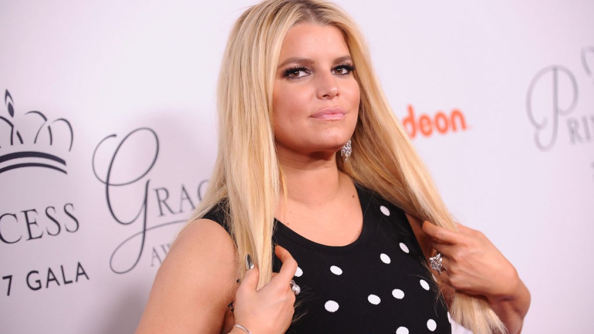 See Jessica Simpson Wear Her 8th Quality Cheerleader Jacket