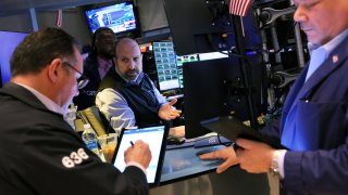 Traders work on the floor of the New York Stock Exchange (NYSE) during morning trading on February 01, 2023 in New York City.