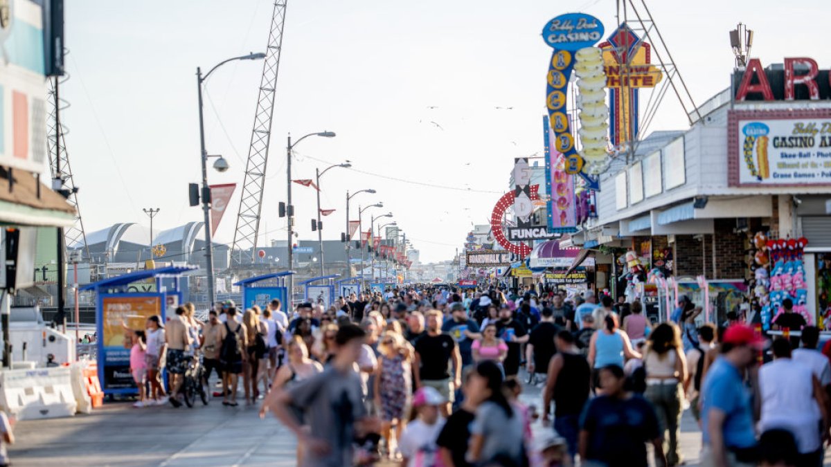 Summer tourists flock to boardwalks and piers while sticking to their budgets Summer tourists flock to boardwalks and piers while sticking to their budgets
