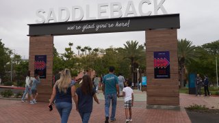 FILE - Congregants arrive at Saddleback Church in Lake Forest, Calif., on Oct. 16, 2022.