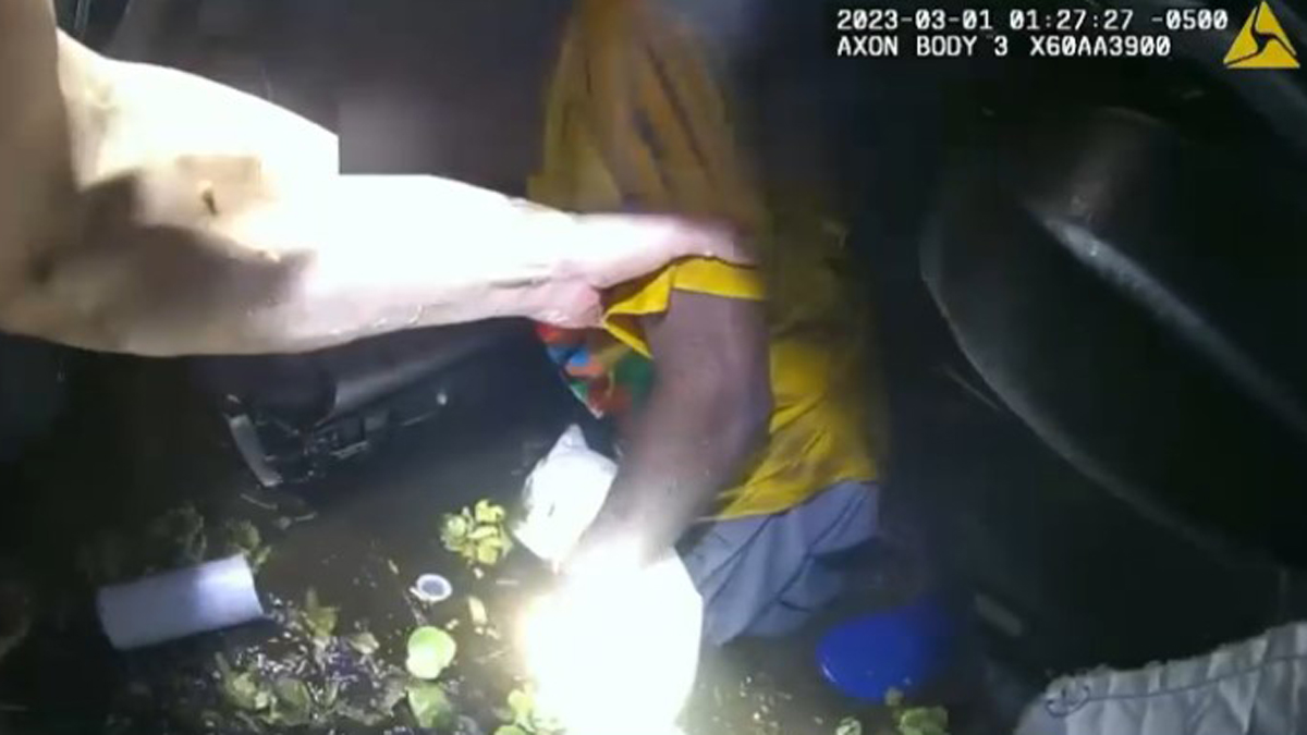 Dramatic Video Shows Florida Deputies Rescuing Driver From Submerged Car After Phone SOS Signal