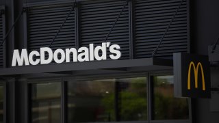 Signage is displayed outside the new McDonald’s Corp. headquarters in Chicago, Illinois, U.S., on Monday, June 4, 2018.