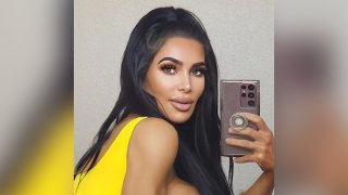 Christina Ashten Gourkani, a Kim Kardashian look-alike model, poses for a selfie.