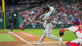 Luis Arraez of the Miami Marlins throws to first base for an out News  Photo - Getty Images