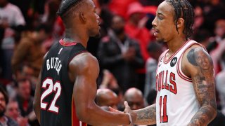 CHICAGO, ILLINOIS – MARCH 18: DeMar DeRozan #11 of the Chicago Bulls and Jimmy Butler #22 of the Miami Heat shake hands after the game at United Center on March 18, 2023 in Chicago, Illinois.  NOTE TO USER: User expressly acknowledges and agrees that, by downloading and or using this photograph, User is consenting to the terms and conditions of the Getty Images License Agreement.  (Photo by Quinn Harris/Getty Images)