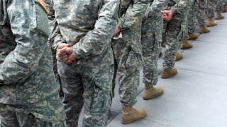 FILE - U.S. Soldiers lining up in New York City.