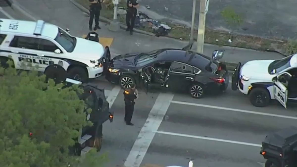 Man Surrenders to Police After Barricading Himself in Stolen Vehicle in ...