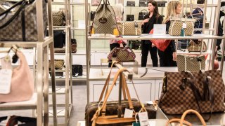 Customers during the grand re-opening of a Century 21 department store in New York, US, on Tuesday, May 16, 2023.