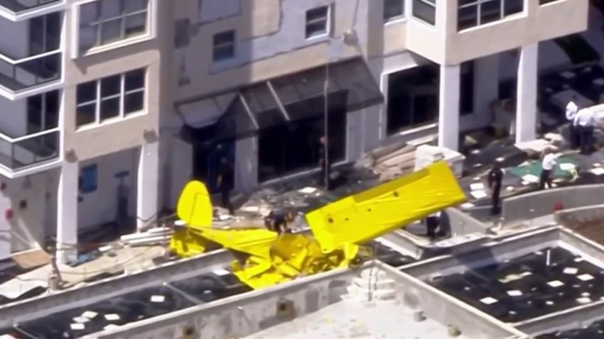 Pilot Identified, 911 Calls Released in Banner Plane Crash