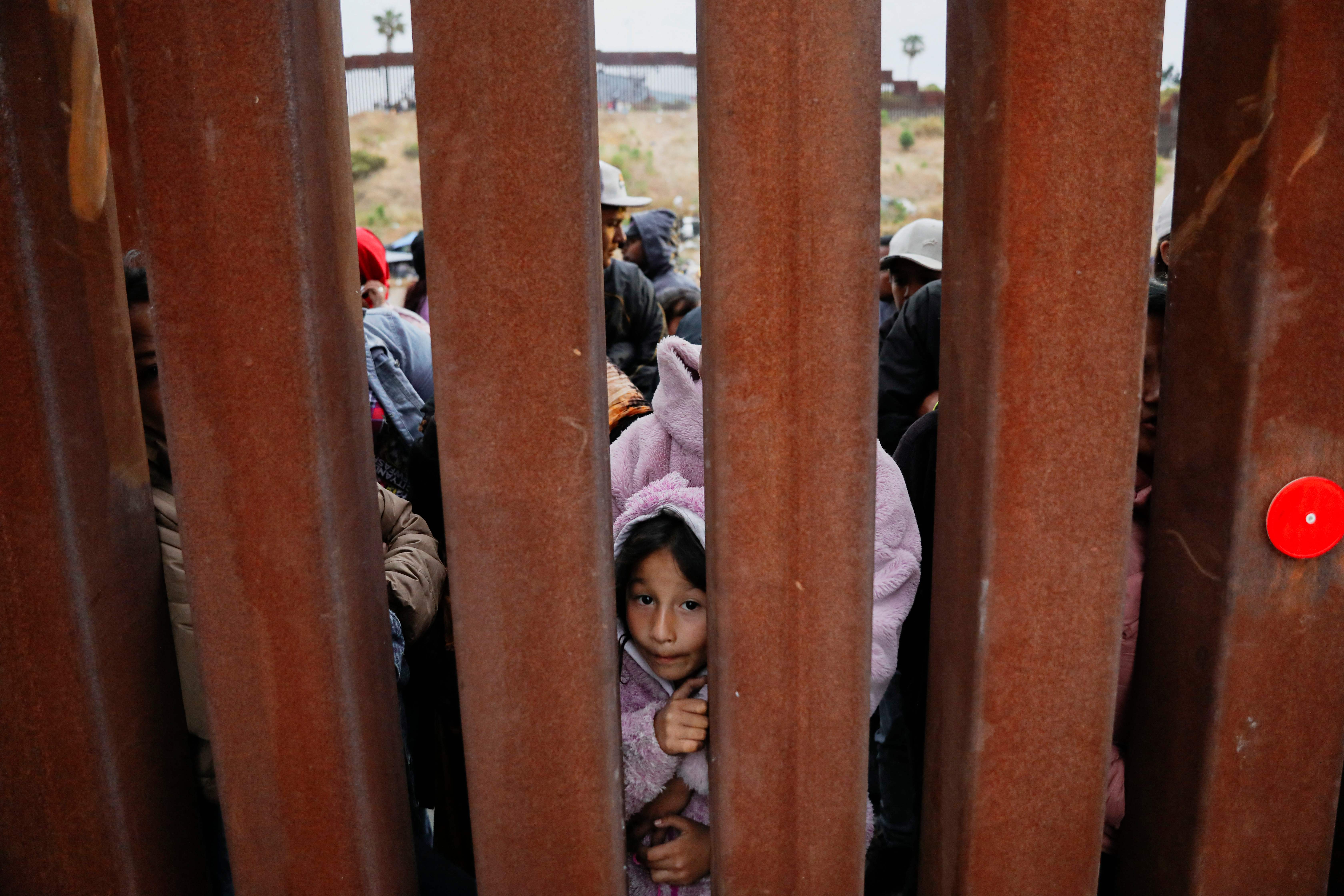 Migrants wait for asylum hearings at the US-Mexico border, May 10, 2023, as seen from San Ysidro, California.