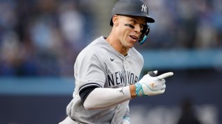 Aaron Judge #99 of the New York Yankees runs out a home run in the first inning of their MLB game against the Toronto Blue Jays at Rogers Centre on May 15, 2023 in Toronto, Canada.