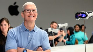 Apple CEO Tim Cook speaks with media members at a viewing area for new products during Apple’s Worldwide Developers Conference (WWDC) at the Apple Park campus in Cupertino, California, on June 5, 2023.