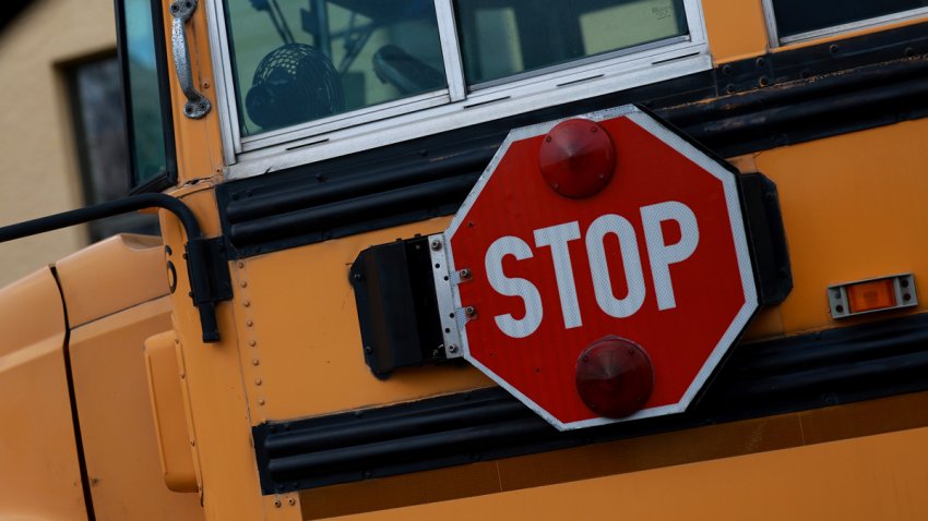 A stop sign attached to a school bus is shown on April 19, 2023 in Miami, Florida.  (Photo by Joe Raedle/Getty Images)