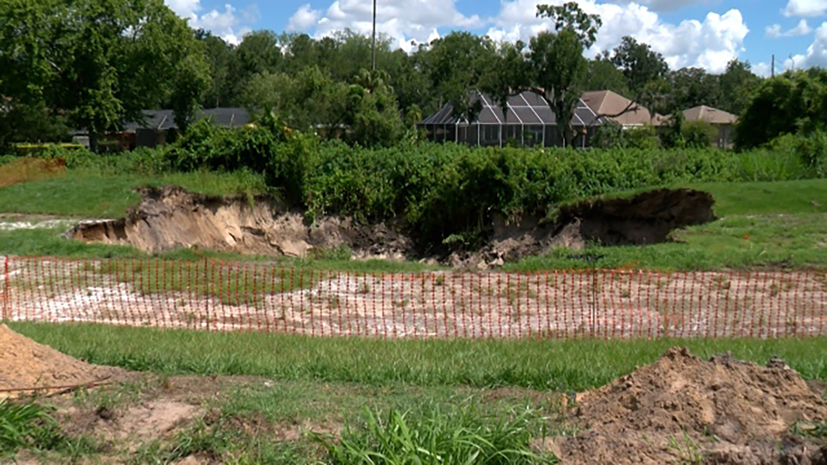 Residents concerned after massive sinkhole opens up in neighborhood