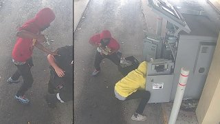 The FBI is searching for suspects who robbed an armored truck in Miami Gardens at gunpoint.