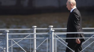 Russian President Vladimir Putin leaves the site of the annual Navy Day parade on July 30, 2023, in St. Petersburg, Russia.