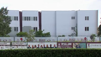 Parkland families walk through 1200 building