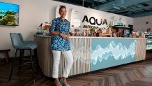 Roia Jabari, managing director of AQUA Water Bar by LUQEL poses at her store in Dubai, United Arab Emirates, Tuesday, July 11, 2023. 