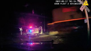 Officer who put suspect in car hit by train found guilty of ...