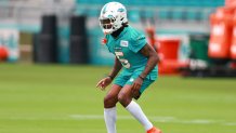 Miami Dolphins safety Jevon Holland, left, and cornerback Jalen