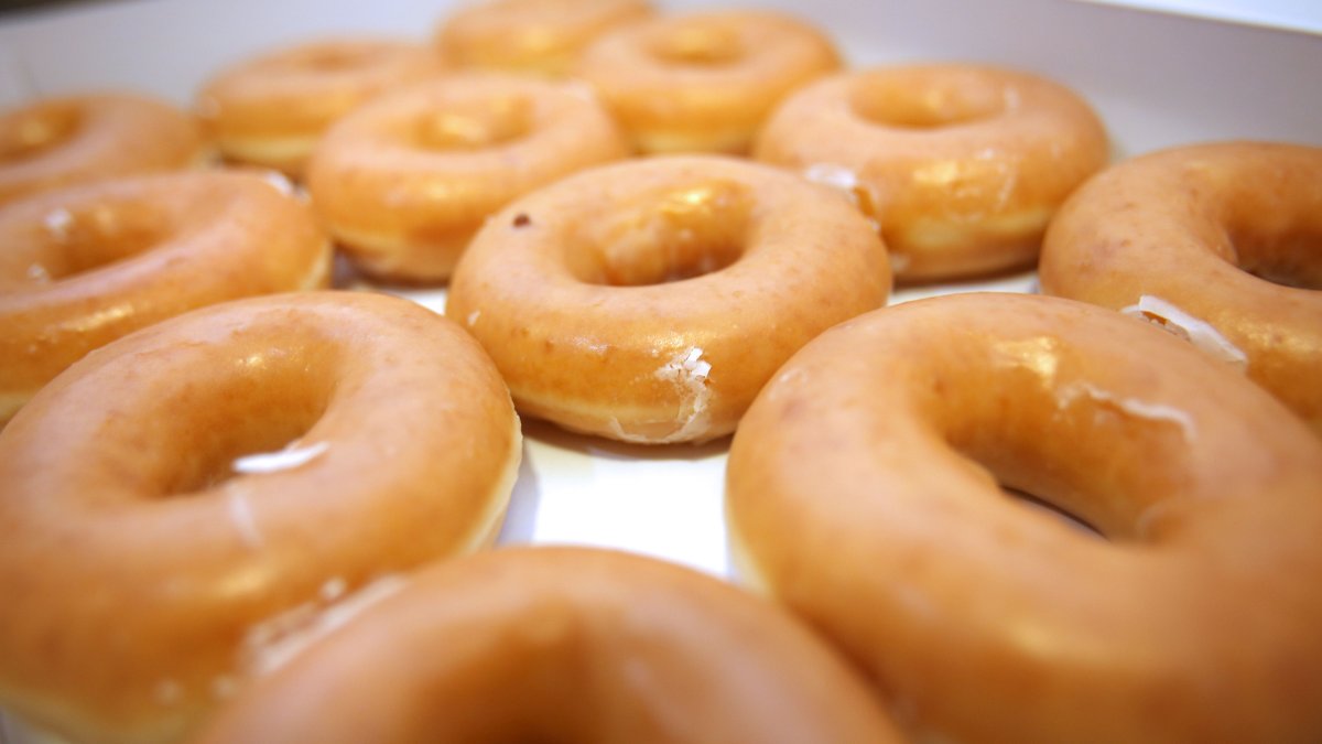 Krispy Kreme is promoting a dozen doughnuts for 86 cents — but only for a person working day