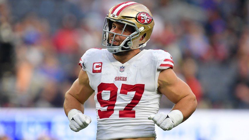 Oct 30, 2022; Inglewood, California, USA; San Francisco 49ers defensive end Nick Bosa (97) reacts after sacking Los Angeles Rams quarterback Matthew Stafford (9) during the second half at SoFi Stadium. Mandatory Credit: Gary A. Vasquez-USA TODAY Sports