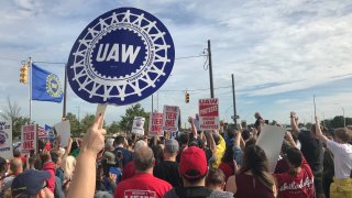 Striking United Auto Workers members and supporters attend a speech by Vermont Sen. Bernie Sanders outside General Motors’ Detroit-Hamtramck Assembly plant on Sept. 25, 2019 in Detroit.