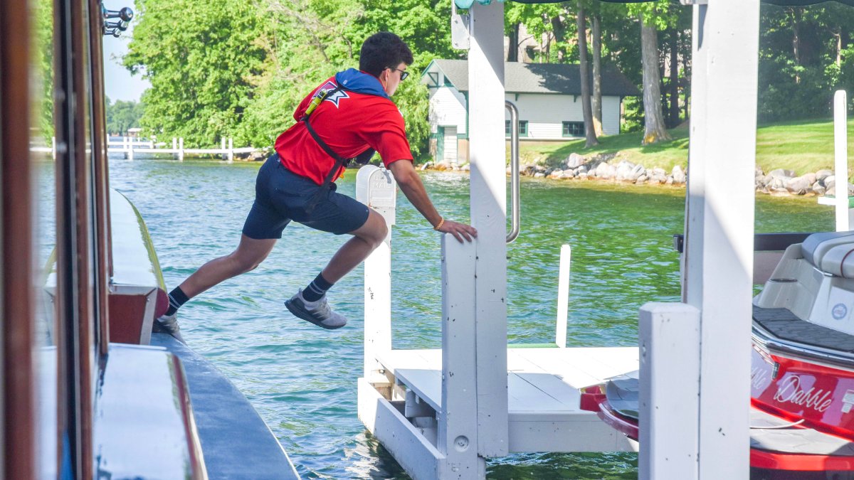 'The coolest summer job': These teens jump off a moving boat to deliver mail in Wisconsin – NBC 6 South Florida - Vimarsana News