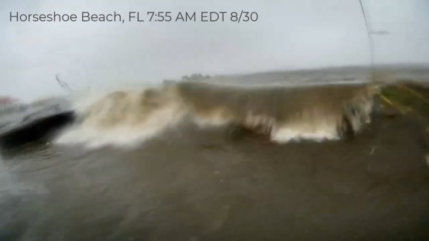 Debris floats in heavy flooding at Horseshoe Beach, Florida from Hurricane Idalia