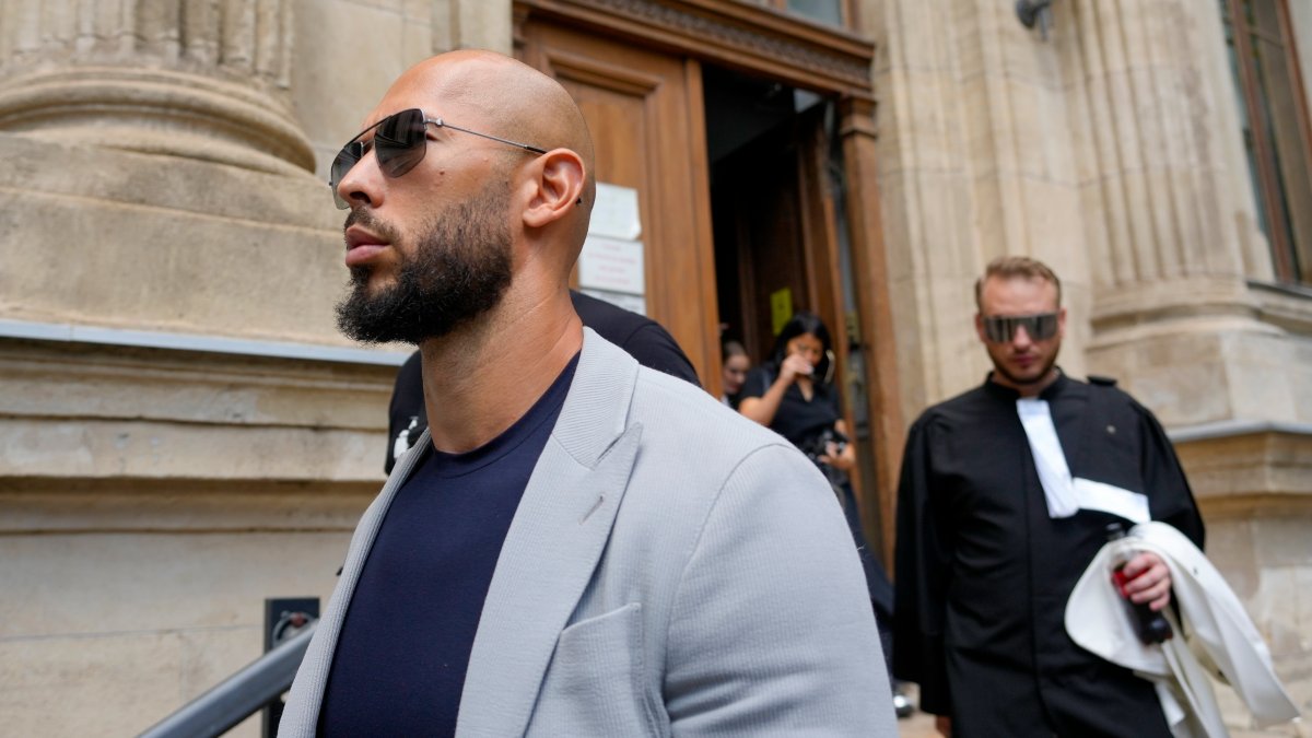 Influencer Andrew Tate released from home arrest even though he awaits rape and trafficking trial Influencer Andrew Tate released from home arrest even though he awaits rape and trafficking trial