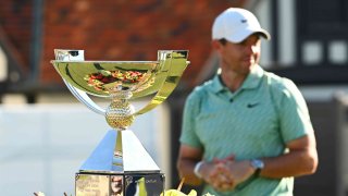 Rory McIlroy of Northern Ireland waits behind the FedEx Cup during the final round of the TOUR Championship at East Lake Golf Club on August 28, 2022 in Atlanta, Georgia.