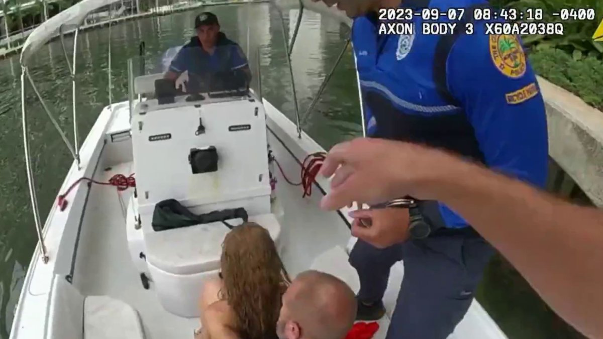 Bodycam shows officers respond to naked woman who jumped into water ...