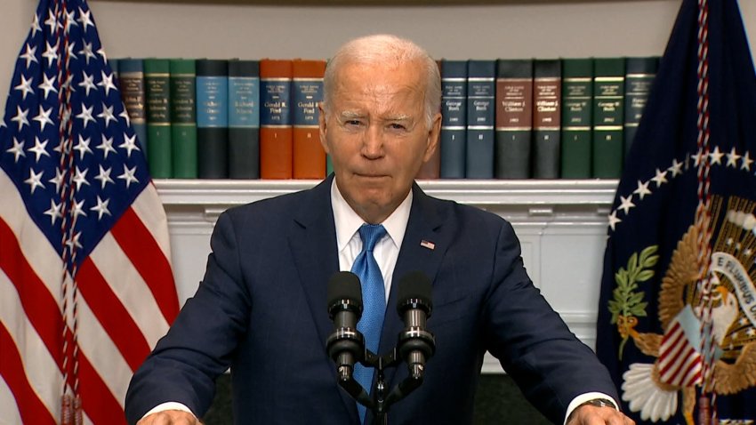 Joe Biden at a podium at the White House