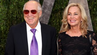 File – Jimmy Buffett and wife Jane Slagsvol arrive at the 2013 Vanity Fair Academy Awards Oscars Party at Sunset Tower Hotel in West Hollywood on Feb. 14, 2013.