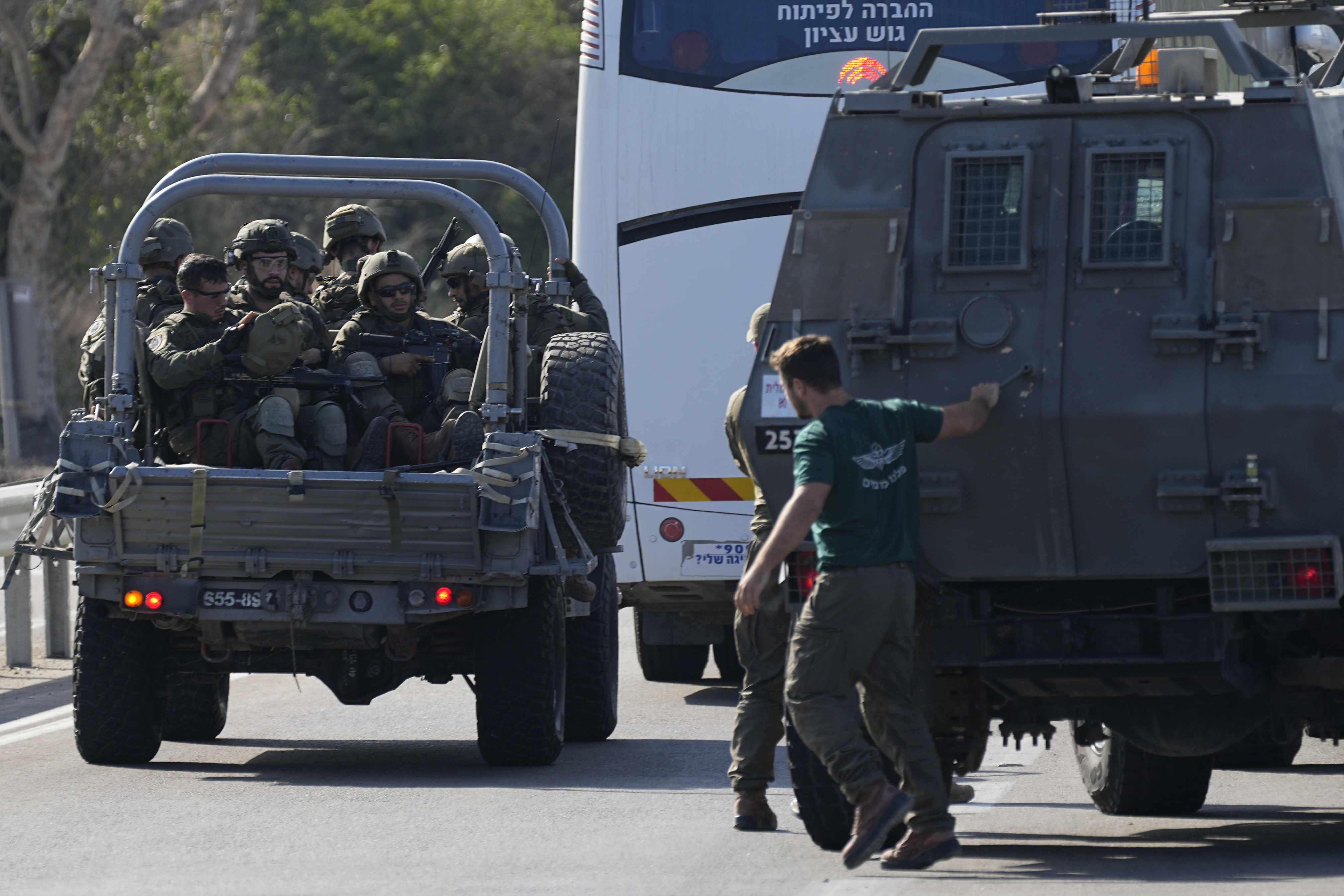 Israeli soldiers head south near Ashkelon, Israel, Israel, on Saturday, Oct. 7, 2023.