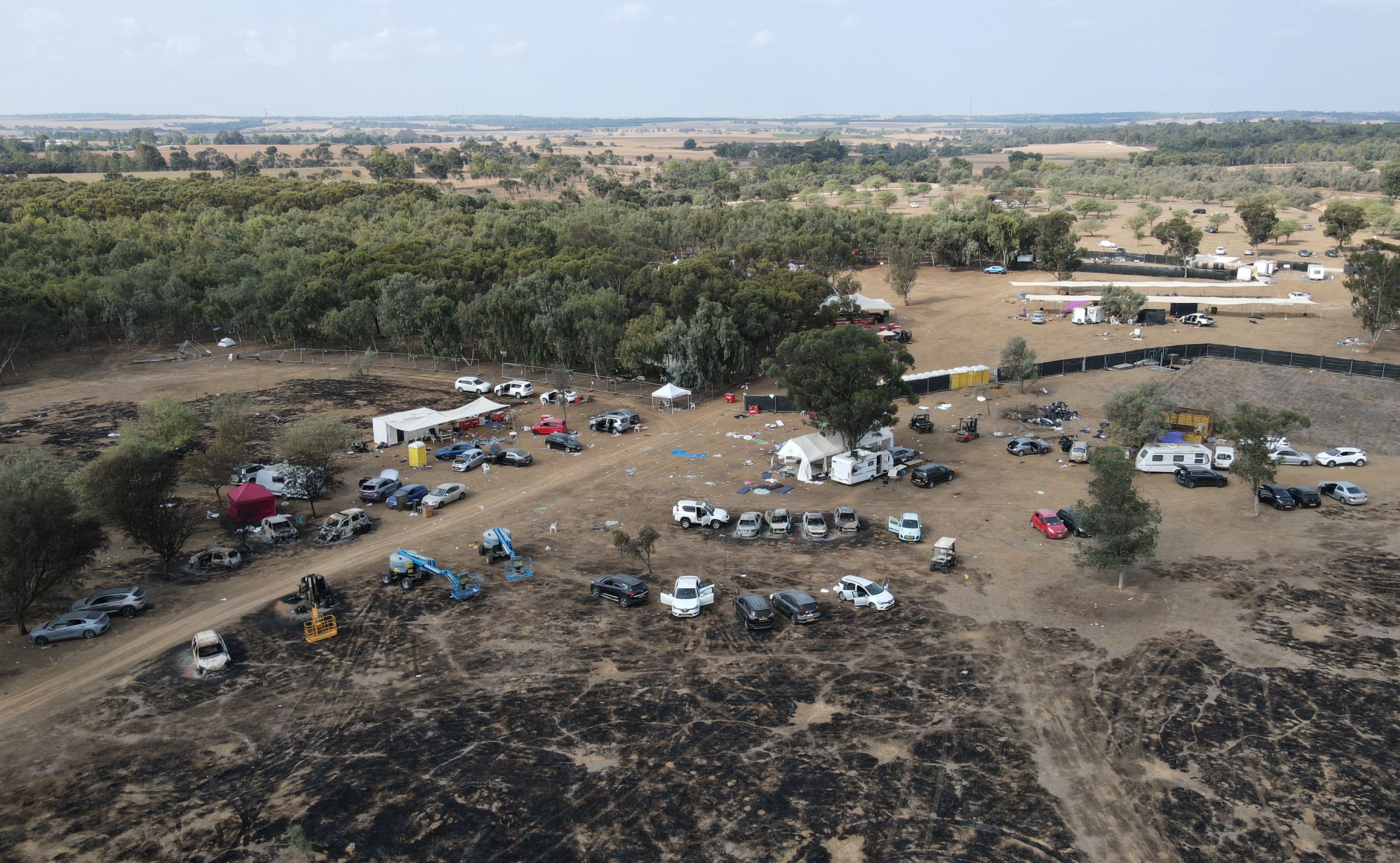 An aerial picture shows the site of the weekend attack on the Supernova desert music festival by Palestinian militants near Kibbutz Reim in the Negev desert in southern Israel on Oct. 10, 2023.