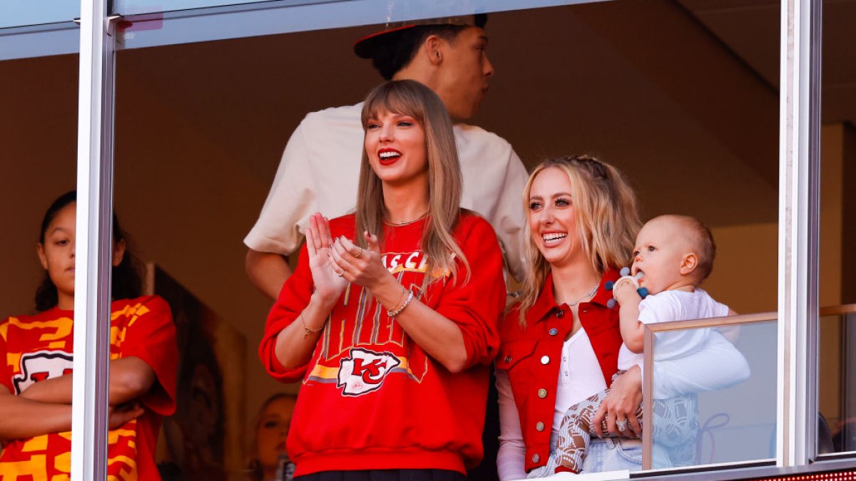 Taylor Swift wears her heart on her sleeve as she cheers on Travis Kelce
