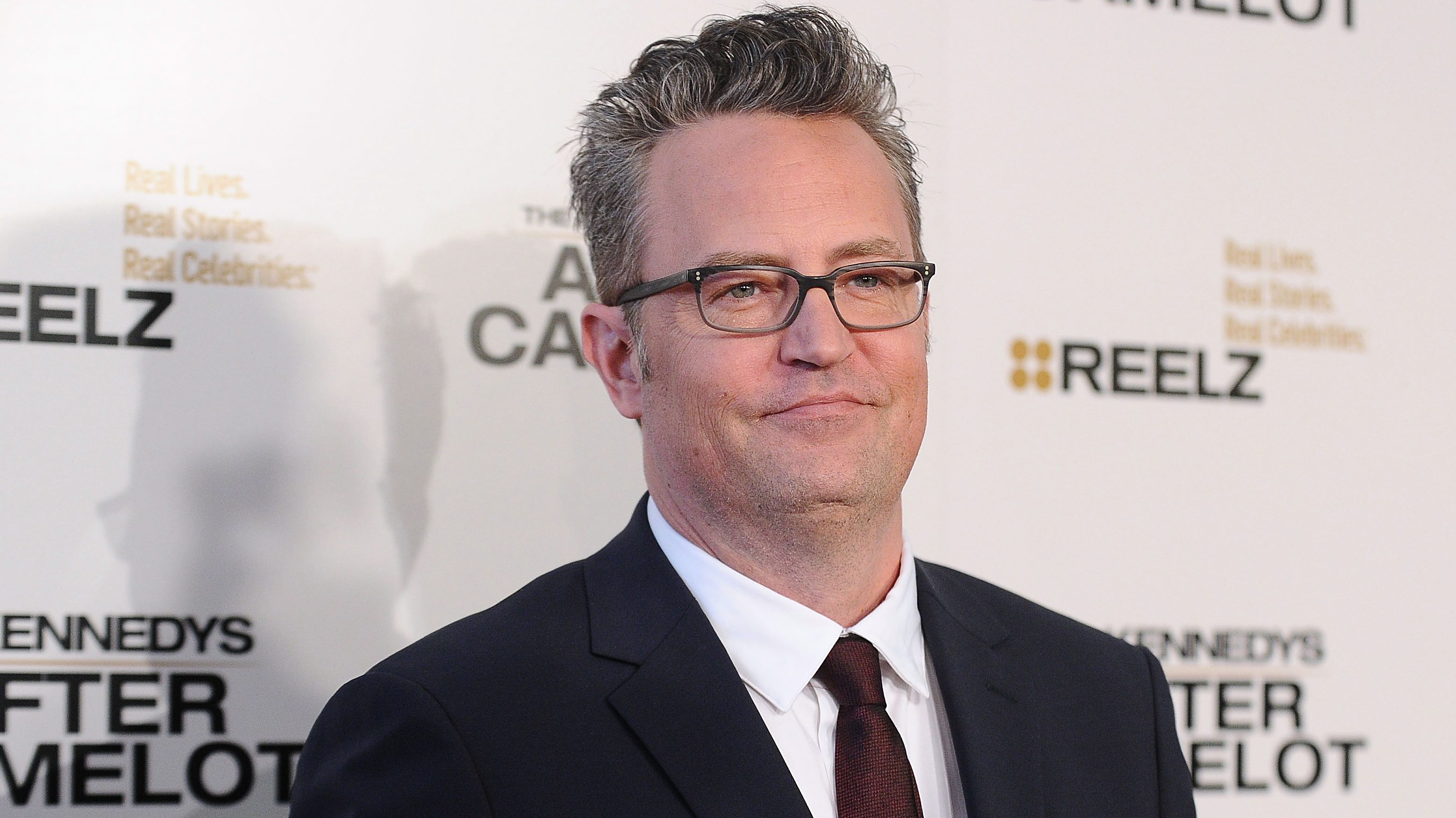 New Yorkers are flocking to the 'Friends' apartment to mourn the death of  Matthew Perry