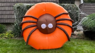 Dunkin's inflatable spider doughnut, on sale for Halloween 2023.