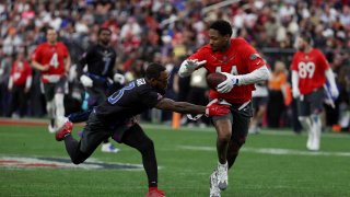 AFC wide receiver Stefon Diggs of Buffalo Bills runs with the ball against NFC safety Budda Baker of Arizona Cardinals during the Pro Bowl Games on Feb. 5, 2023.