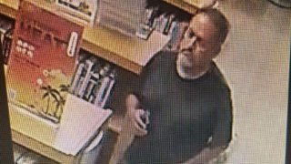 A surveillance image from Miami Springs Police shows a man accused off exposing himself inside a public library.