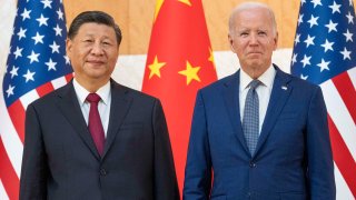 U.S. President Joe Biden, right, stands with Chinese President Xi Jinping