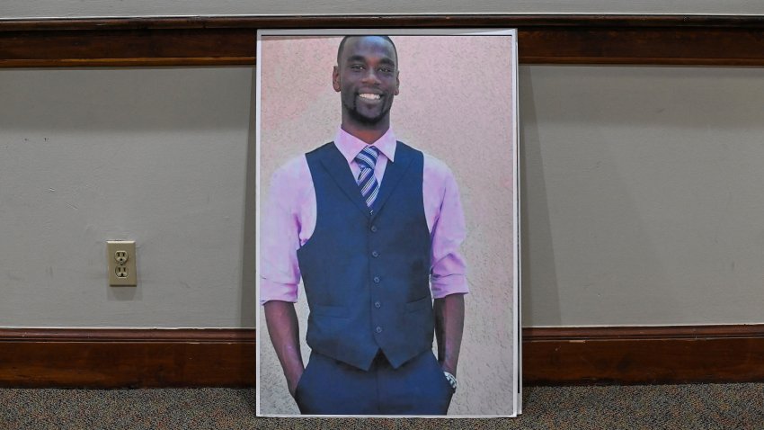 MEMPHIS, TN – JANUARY 29:  A photo of Tyre Nichols is displayed outside the sanctuary during church service at Mt. Olive Cathedral CME Church on January 29, 2023 in Memphis, Tennessee. Tyre Nichols was remembered during the service. Nichols, a 29-year-old Black man was pulled over by Memphis police officers during a traffic stop on January 7, and soon after beaten unconscious by five officers. Memphis police officers Tadarrius Bean, Demetrius Haley, Emmitt Martin III, Desmond Mills Jr., and Justin Smith were all fired from the department and arrested on multiple charges including second-degree murder. (Photo by Joshua Lott/The Washington Post via Getty Images)