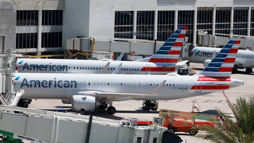 American Airline planes parked at their Miami International Airport terminal gates on May 02, 2023 in Miami, Florida. (Photo by Joe Raedle/Getty Images)