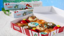 A box of Elf-themed Krispy Kreme Donuts.