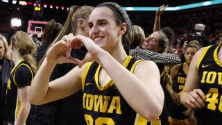 Caitlin Clark of the Iowa Hawkeyes celebrates a 67-58 win over the Iowa State Cyclones at Hilton Coliseum on Dec. 6, 2023, in Ames, Iowa.