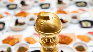 A Golden Globe statue at the Golden Globe Awards Plate Up Preview.