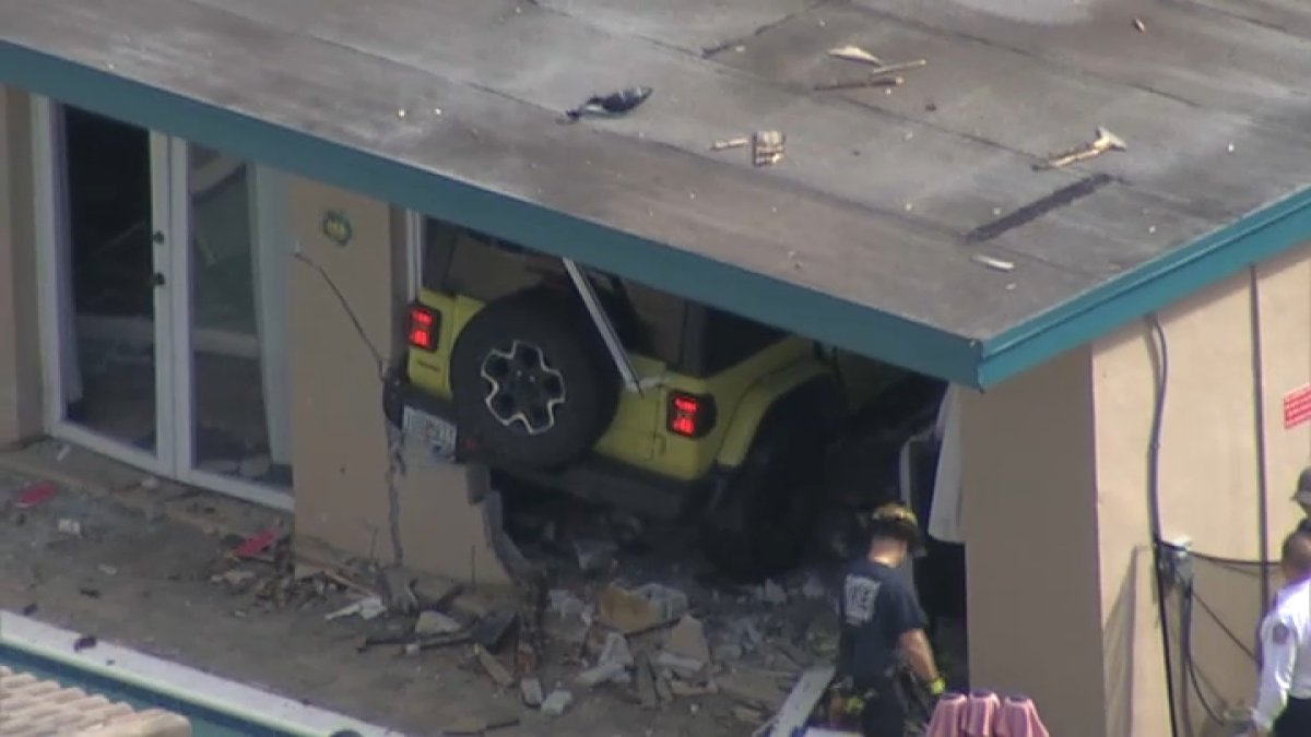 Video shows moments after woman plowed Jeep into Fort Lauderdale home ...